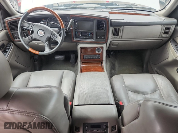 2004 Cadillac Escalade z VIN 1GYEC63T64R285823, wystawiony jako Copart lot #59167915 z przebiegiem 289 955 mil mil oraz Szkoda całkowita • Salvage title. Historia ofert i sprzedaży dostępna na DreamBid. Obrazek 8.