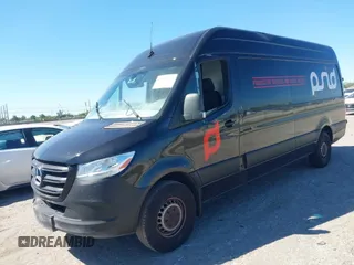 2019 Mercedes-Benz Sprinter Cargo z VIN WD4PF1CD8KP143473, wystawiony jako IAAI lot #41825674 z przebiegiem 99 261 mil mil oraz . Historia ofert i sprzedaży dostępna na DreamBid. Obrazek 2.