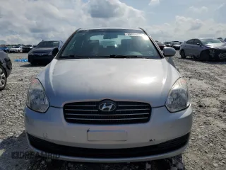 2011 Hyundai Accent GLS z VIN KMHCN4AC9BU602370, wystawiony jako Copart lot #58574905 z przebiegiem 184 916 mil mil oraz Szkoda całkowita • Salvage title. Historia ofert i sprzedaży dostępna na DreamBid. Obrazek 5.