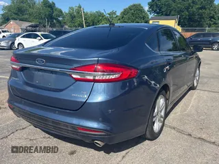 2018 Ford Fusion Hybrid SE with VIN 3FA6P0LU7JR261105, listed as a Copart auction lot 55692065 with 122,782 mi miles and Clean Title. Bid and sale history available at carsss.com. Image 4.