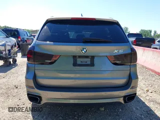 2014 BMW X5 xDrive35i z VIN 5UXKR0C5XE0K42788, wystawiony jako IAAI lot #42263399 z przebiegiem 138 644 mil mil oraz . Historia ofert i sprzedaży dostępna na DreamBid. Obrazek 16.