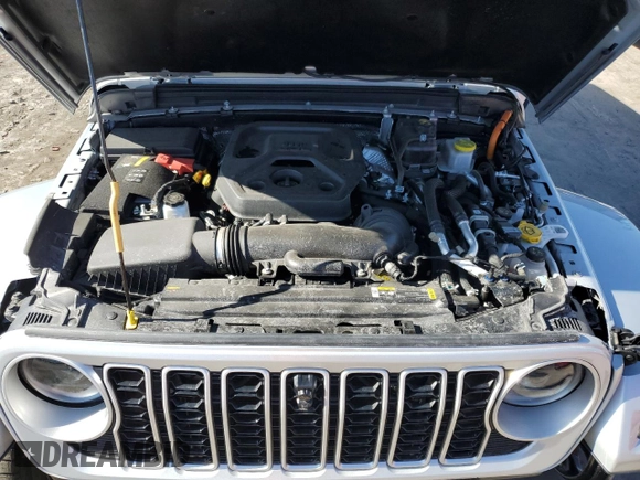 2024 Jeep Wrangler Sahara with VIN 1C4RJXP63RW195206, listed as a Copart auction lot 48784595 with 10,737 mi miles and Salvage Title. Bid and sale history available at DreamBid. Image 12.