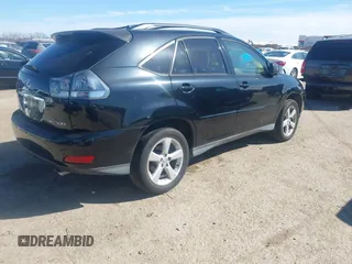 2006 Lexus RX 330 with VIN JTJGA31U560061137, listed as a IAAI auction lot 41686946 with 158,094 mi miles. Bid and sale history available at carsss.com. Image 4.
