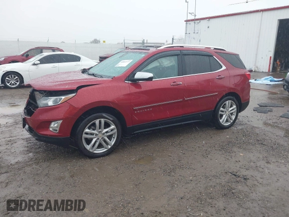 2018 Chevrolet Equinox Premier with VIN 2GNAXVEVXJ6115268, listed as a IAAI auction lot 40881577 with 61,910 mi miles and . Bid and sale history available at DreamBid. Image 2.