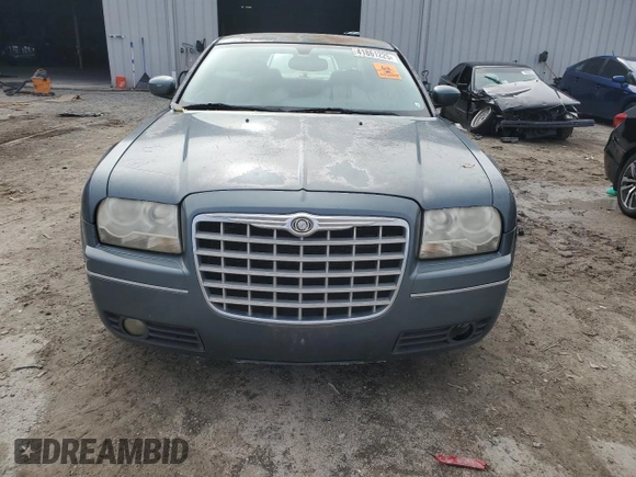 2005 Chrysler 300 with VIN 2C3JA53G65H651700, listed as a Copart auction lot 41861225 with 247,771 mi miles and Salvage Title. Bid and sale history available at carsss.com. Image 5.