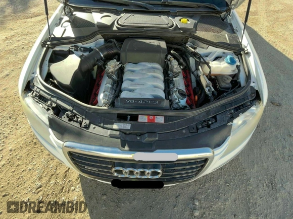 2009 Audi A8 4.2L with VIN WAUMV94E19N002897, listed as a Copart auction lot 64525445 with 140,526 mi miles and Clean title. Bid and sale history available at DreamBid. Image 7.