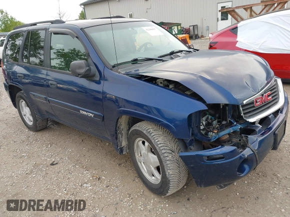 2003 GMC Envoy SLT z VIN 1GKDS13S532309264, wystawiony jako IAAI lot #42200597 z przebiegiem 86 728 mil mil oraz . Historia ofert i sprzedaży dostępna na DreamBid. Obrazek 1.