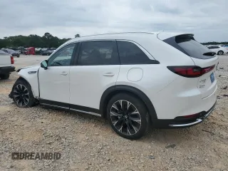 2024 Mazda CX-90 Premium Plus z VIN JM3KKEHA9R1134601, wystawiony jako Copart lot #57727115 z przebiegiem 25 503 mil mil oraz Nie do naprawy • Non repairable. Historia ofert i sprzedaży dostępna na DreamBid. Obrazek 2.