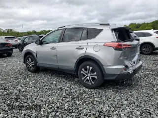 2017 Toyota RAV4 LE z VIN 2T3BFREVXHW547834, wystawiony jako Copart lot #57886525 z przebiegiem 97 586 mil mil oraz Szkoda całkowita • Salvage title. Historia ofert i sprzedaży dostępna na DreamBid. Obrazek 2.