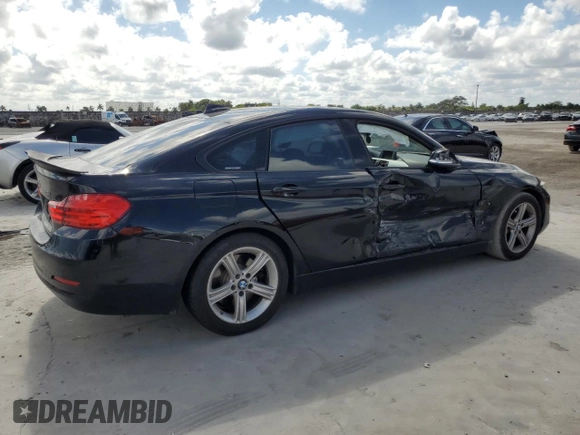 2015 BMW 4 Series 428i with VIN WBA4A5C55FD410360, listed as a Copart auction lot 44335485 with 144,997 mi miles and Salvage Title. Bid and sale history available at DreamBid. Image 3.