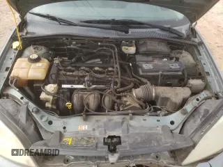 2006 Ford Focus S with VIN 1FAHP37N76W180039, listed as a Copart auction lot 58328565 with 220,696 mi miles and Salvage title. Bid and sale history available at DreamBid. Image 12.