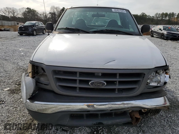 2003 Ford F-150 XL z VIN 1FTRF18W53NB45997, wystawiony jako Copart lot #42451525 z przebiegiem 149 166 mil mil oraz Szkoda całkowita • Salvage title. Historia ofert i sprzedaży dostępna na DreamBid. Obrazek 5.