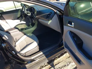 2015 Kia Optima EX with VIN 5XXGN4A74FG408253, listed as a IAAI auction lot 41336799 with 126,041 mi miles. Bid and sale history available at carsss.com. Image 5.