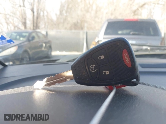 2014 Jeep Compass Latitude with VIN 1C4NJDEBXED661930, listed as a IAAI auction lot 41501558 with 94,133 mi miles and . Bid and sale history available at DreamBid. Image 11.