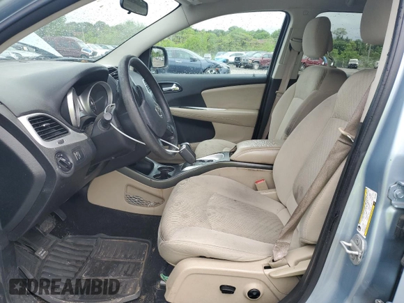 2013 Dodge Journey SXT with VIN 3C4PDCBG0DT619382, listed as a Copart auction lot 56565205 with 176,112 mi miles and Salvage title. Bid and sale history available at DreamBid. Image 7.