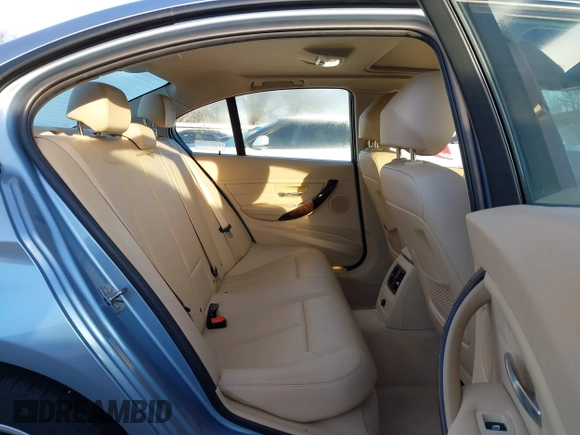 2013 BMW 3 Series 320i with VIN WBA3B1C56DK128089, listed as a IAAI auction lot 41332091 with 101,155 mi miles. Bid and sale history available at carsss.com. Image 7.