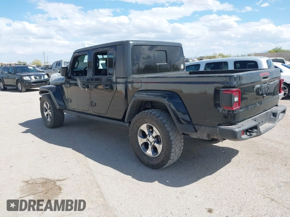 2021 Jeep Gladiator Willys with VIN 1C6HJTAG7ML523718, listed as a IAAI auction lot 42206058 with 48,071 mi miles and . Bid and sale history available at DreamBid. Image 3.