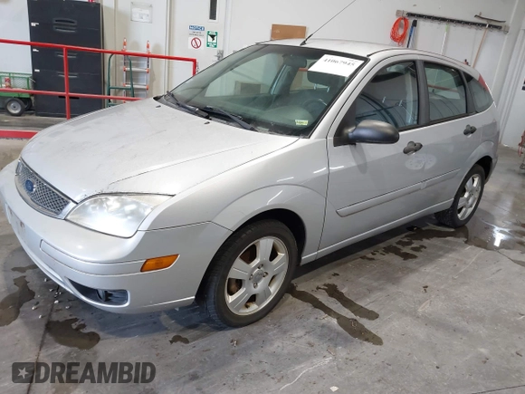2007 Ford Focus S with VIN 1FAHP37N67W221827, listed as a IAAI auction lot 41067945 with 126,489 mi miles and . Bid and sale history available at carsss.com. Image 2.