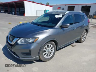 2017 Nissan Rogue SV with VIN KNMAT2MT9HP581822, listed as a IAAI auction lot 42140794 with 74,261 mi miles. Bid and sale history available at carsss.com. Image 17.