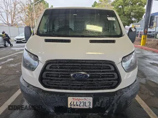 2016 Ford Transit Cargo z VIN 1FTYE1YM9GKB18600, wystawiony jako IAAI lot #42726792 z przebiegiem 127 434 mil mil oraz . Historia ofert i sprzedaży dostępna na DreamBid. Obrazek 28.
