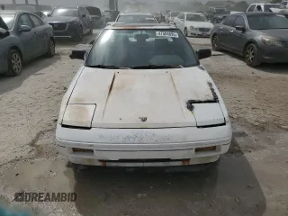 1986 Toyota MR2 z VIN JT2AW15C2G0049232, wystawiony jako Copart lot #47584895 z przebiegiem 185 369 mil mil oraz Tytuł czysty. Historia ofert i sprzedaży dostępna na DreamBid. Obrazek 5.