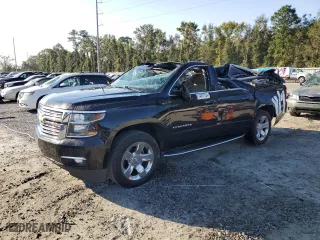 2018 Chevrolet Suburban Premier with VIN 1GNSCJKCXJR235829, listed as a Copart auction lot 74817724 with 90,067 mi miles and Non Repairable. Bid and sale history available at carsss.com. Image 1.