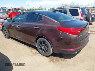 2012 Kia Optima EX with VIN 5XXGN4A77CG042624, listed as a IAAI auction lot 41974769 with 109,229 mi miles and . Bid and sale history available at carsss.com. Image 3.