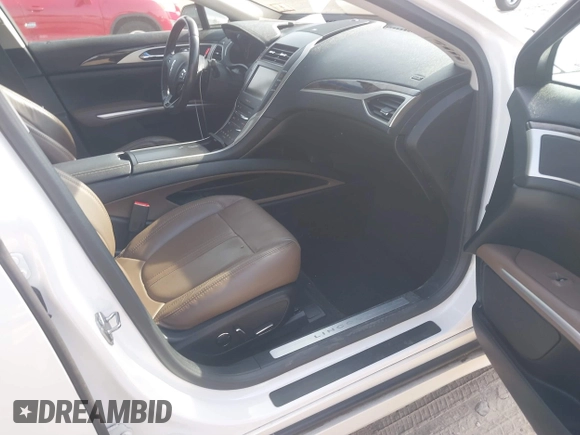 2016 Lincoln MKZ with VIN 3LN6L2J91GR620193, listed as a IAAI auction lot 41807038 with 61,235 mi miles. Bid and sale history available at carsss.com. Image 5.