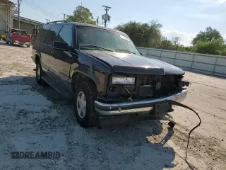 1997 GMC Yukon with VIN 1GKEK13R7VJ711782, listed as a Copart auction lot 74793184 with 208,718 mi miles and Salvage Title. Bid and sale history available at carsss.com. Image 11.