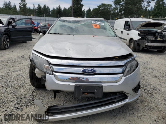 2012 Ford Fusion Hybrid с VIN 3FADP0L30CR284761, выставлен на аукционе Copart как лот 61286445 с пробегом 171 073 миль миль и Списание • Salvage title. История ставок и продаж доступна на DreamBid. Изображение 5.