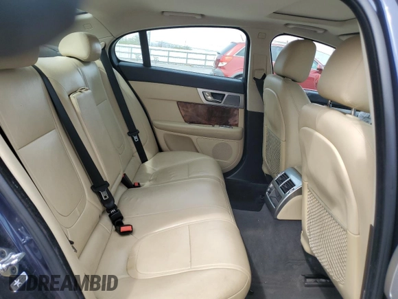 2014 Jaguar XF SC with VIN SAJWA0EX3E8U17748, listed as a Copart auction lot 52010435 with 84,685 mi miles and Salvage Title. Bid and sale history available at DreamBid. Image 10.