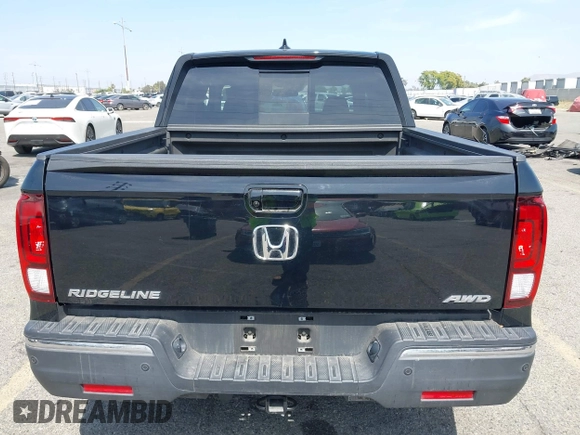 2020 Honda Ridgeline RTL-E with VIN 5FPYK3F70LB009376, listed as a IAAI auction lot 42488529 with 30,932 mi miles and . Bid and sale history available at DreamBid. Image 16.