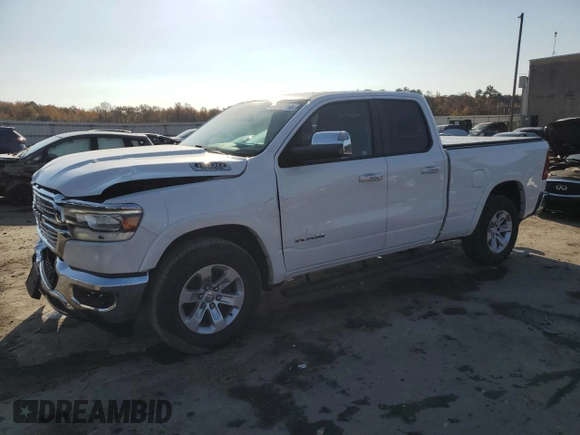 2019 Ram 1500 Laramie with VIN 1C6SRFDTXKN674871, listed as a Copart auction lot 77143314 with 30,418 mi miles and Salvage Title. Bid and sale history available at carsss.com. Image 1.