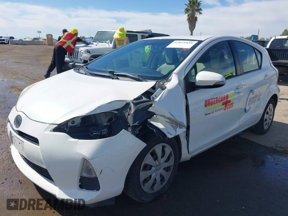 2014 Toyota Prius One with VIN JTDKDTB35E1561818, listed as a IAAI auction lot 42021039 with 184,584 mi miles and . Bid and sale history available at DreamBid. Image 2.