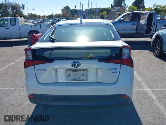 2020 Toyota Prius L Eco with VIN JTDKARFUXL3107211, listed as a IAAI auction lot 42797561 with 328,023 mi miles and . Bid and sale history available at DreamBid. Image 16.