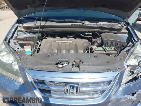 2006 Honda Odyssey EX-L with VIN 5FNRL38796B099851, listed as a IAAI auction lot 41555109 with 154,707 mi miles and . Bid and sale history available at DreamBid. Image 10.