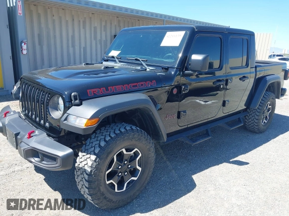 2023 Jeep Gladiator Rubicon z VIN 1C6JJTBG3PL531982, wystawiony jako IAAI lot #42211139 z przebiegiem 28 301 mil mil oraz . Historia ofert i sprzedaży dostępna na DreamBid. Obrazek 17.