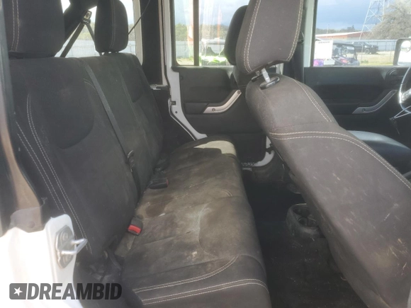 2016 Jeep Wrangler Unlimited Rubicon with VIN 1C4BJWFG1GL229485, listed as a Copart auction lot 49350065 with 75,039 mi miles and Salvage Title. Bid and sale history available at carsss.com. Image 12.