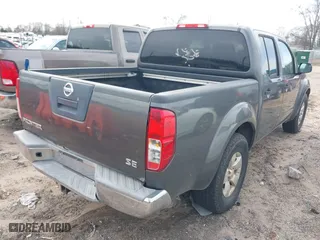 2009 Nissan Frontier SE with VIN 1N6AD07U39C417025, listed as a IAAI auction lot 41687802 with 185,981 mi miles. Bid and sale history available at carsss.com. Image 4.