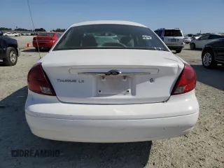 2000 Ford Taurus LX with VIN 1FAFP5222YA168638, listed as a Copart auction lot 60710415 with 119,948 mi miles and Salvage title. Bid and sale history available at DreamBid. Image 6.
