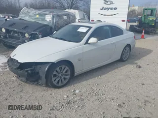 2013 BMW 3 Series 328i xDrive with VIN WBAKF5C56DE657855, listed as a IAAI auction lot 41441799 with 107,581 mi miles. Bid and sale history available at carsss.com. Image 2.