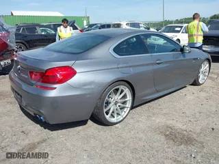 2012 BMW 6 Series 650i with VIN WBALX3C5XCC528484, listed as a IAAI auction lot 42080063 with 120,995 mi miles. Bid and sale history available at carsss.com. Image 4.