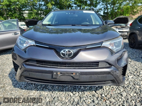 2017 Toyota RAV4 LE with VIN JTMBFREV5HJ146464, listed as a Copart auction lot 61841125 with 125,365 mi miles and Salvage title. Bid and sale history available at DreamBid. Image 5.