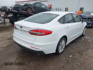 2020 Ford Fusion SE with VIN 3FA6P0HD5LR136325, listed as a IAAI auction lot 41200798 with 120,696 mi miles. Bid and sale history available at carsss.com. Image 4.
