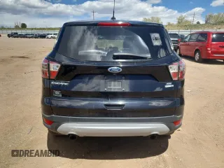 2017 Ford Escape SE with VIN 1FMCU9GD9HUD11375, listed as a Copart auction lot 54952235 with 154,345 mi miles and Clean Title. Bid and sale history available at DreamBid. Image 6.