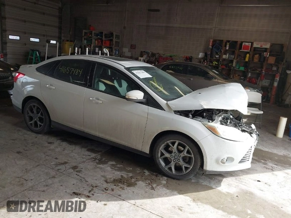 2013 Ford Focus SE with VIN 1FADP3F21DL306920, listed as a IAAI auction lot 41657484 with 172,116 mi miles. Bid and sale history available at carsss.com. Image 1.