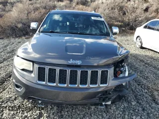 2015 Jeep Grand Cherokee Overland with VIN 1C4RJFCT4FC118184, listed as a Copart auction lot 44465045 with 143,149 mi miles and Salvage Title. Bid and sale history available at carsss.com. Image 5.