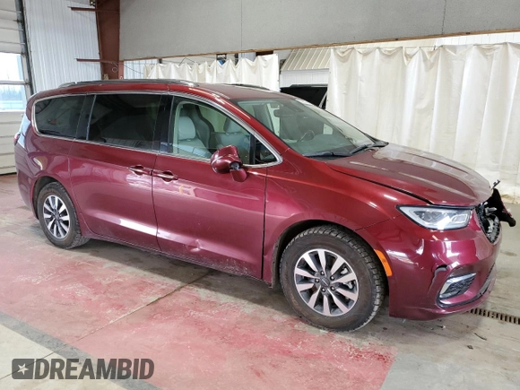 2021 Chrysler Pacifica Hybrid Touring L with VIN 2C4RC1L77MR596250, listed as a Copart auction lot 52892595 with 114,876 mi miles and Salvage title. Bid and sale history available at DreamBid. Image 4.