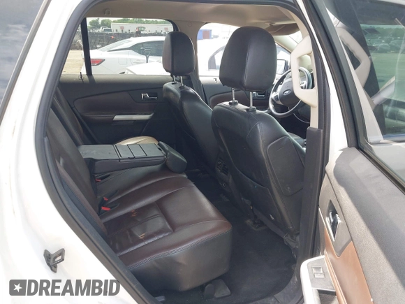 2013 Ford Edge Limited z VIN 2FMDK3KC9DBC35209, wystawiony jako IAAI lot #42368918 z przebiegiem 200 582 mil mil oraz . Historia ofert i sprzedaży dostępna na DreamBid. Obrazek 8.
