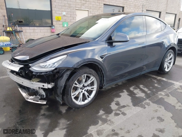 2021 Tesla Model Y Long Range with VIN 5YJYGDEE5MF240579, listed as a IAAI auction lot 41626674 with 98,384 mi miles. Bid and sale history available at carsss.com. Image 20.